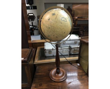 A modern globe on a turned wood base with internal light - NO RESERVE