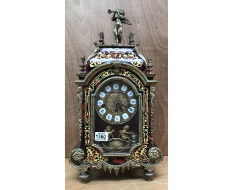 An impressive gilt brass mounted boulle mantle clock with a Franz Hermle Westminster chiming movement.