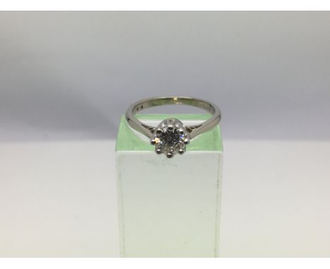 An 18ct white gold diamond solitaire ring, approx .60ct, approx 2.8g and approx size K.