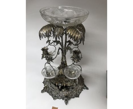 An  large and impressive Victorian silver plated four branch  epergne   In the style of elckington The cut glass bowl support