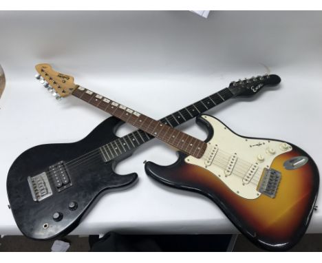 A group of guitar equipment to include two electric guitars by Encore and Rockwood, a Piggy by Prince amplifier, a Boss Flang