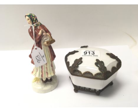 A Goldscheider ceramic figure of a young girl with a rabbit in a basket. And a metal mounted ceramic dish. (2)