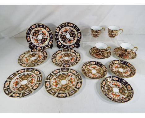 Royal Crown Derby - fifteen pieces of Royal Crown Derby Imari ware in pattern #2451 comprising four cups, five saucers and si