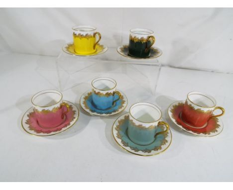 Six coffee cups and six saucers by Aynsley Est £20 - £40.