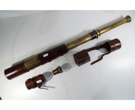 A WWI British military lacquered brass and brown leather signalling telescope TEL SIG (Mk IV) also G.S by R &amp; J Beck Ltd 
