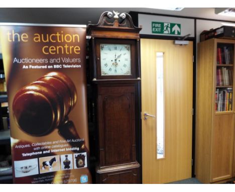 A good 8-day oak and mahogany longcase clock, square reeded columns to trunk, full length door with wavy top, the hood having