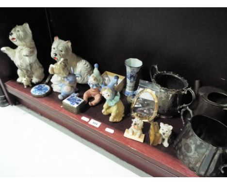 A good mixed lot to include figurines depicting Scottie dogs, a small collection of plated ware, three Nao figurines, a dress