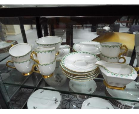 A good lot of 21 pieces of Plant Royal Tuscan china comprising plates, cups, saucers and similar, hand painted and gilded dec