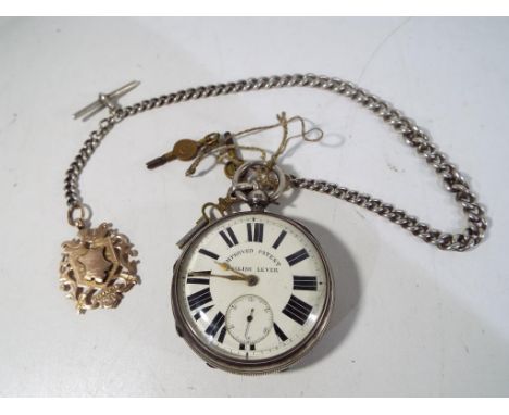 A hallmarked silver cased pocket watch, Chester assay 1896, Roman numerals on a white dial marked Improved Patent, English Le