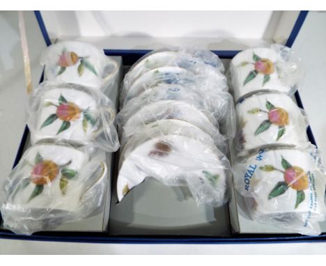 Royal Worcester - an unused set of Royal Worcester cups and saucers decorated in the Arden pattern in presentation box