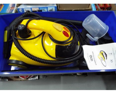 A Little Yell O Steam Cleaner with manual and attachments, minimal use
