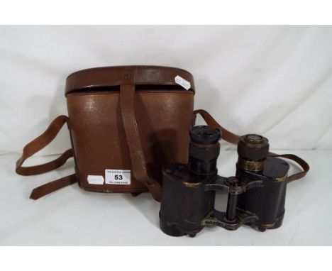 A pair of Taylor - Hobson Bino Prism No. 2  Mk III x 6 military issue binoculars contained in a Bausch and Lomb leather case,