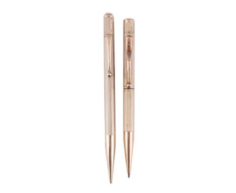 
	
		TWO 9 CARAT GOLD PROPELLING PENCILS 
		Both with engine turned barrels with tapered clips, one with Birmingham 1969 hall