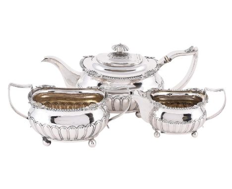 
	
		Y&nbspA GEORGE III SILVER HALF LOBED OBLONG BALUSTER THREE PIECE TEA SET
		SOLOMON HOUGHMAM, LONDON 1811
		The tea pot w