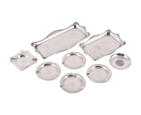 
	
		A COLLECTION OF SILVER TRAYS
		To include: two shaped rectangular trays by W. J. Myatt &amp; Co., Birmingham 1913,16cm (