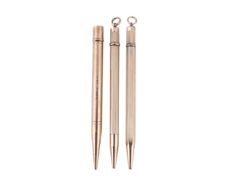 
	
		THREE 9 CARAT GOLD PENCILS 
		The first Sampson Mordan &amp; Co., London 1935, with polished barrel; a 9 carat gold penc