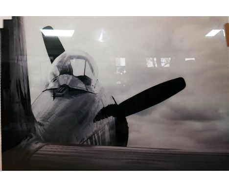 A contemporary print of a plane on perspex, H.79cm W.120cm 