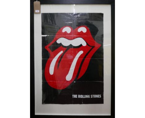 A framed and glazed Rolling Stones poster, 90 x 60cm 