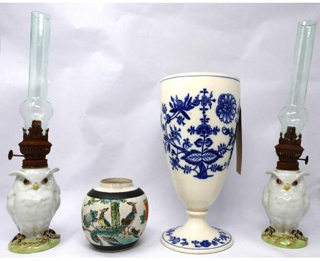 An early 20th century Meissen design ceramic vase, together with two oil lamps in the form of owls and a Chinese ginger jar 