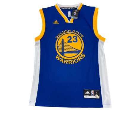 An NBA ‘Golden State Warriors’ basketball jersey shirt, signed by player ‘Draymond Green’. FOOTNOTE: Purchased at a charity a