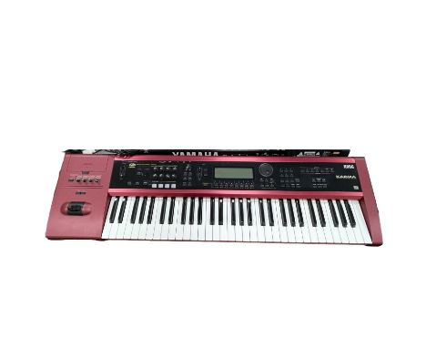 A ‘Korg Karma Music Workstation’ keyboard / piano, general midi system, variable performance model, wheel time controls, EXB 