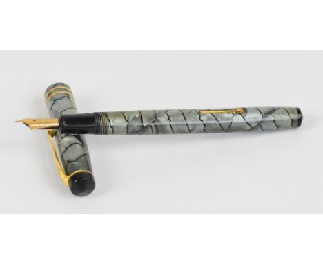A Conway Stewart no.380 fountain pen with reverse cracked ice pearl body and 14ct yellow gold nib, length 12.3cm. CONDITION R