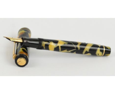 A Wahl Eversharp fountain pen with mottled marbled cream pearl and black decorated body, and Eversharp gold seal nib, length 
