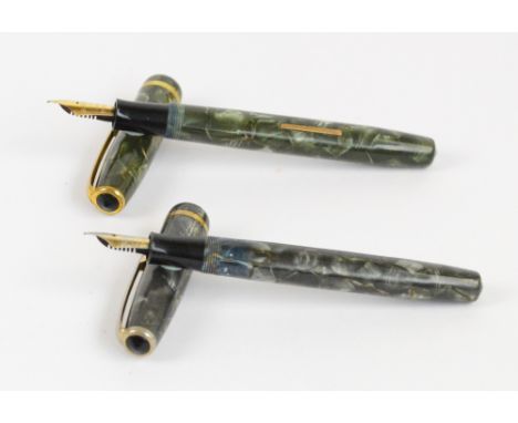 Two Burnham no.48 fountain pens; one with fern green marbled body, one with pearl grey marbled body, both with 14ct gold nibs