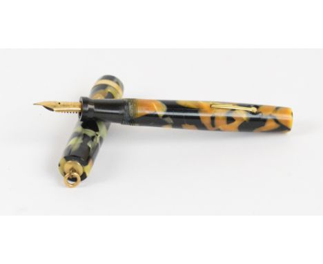 A Moore Pen Co of Boston black and pearl mottled fountain pen with ring loop attachment to the cap, length 11.5cm. CONDITION 