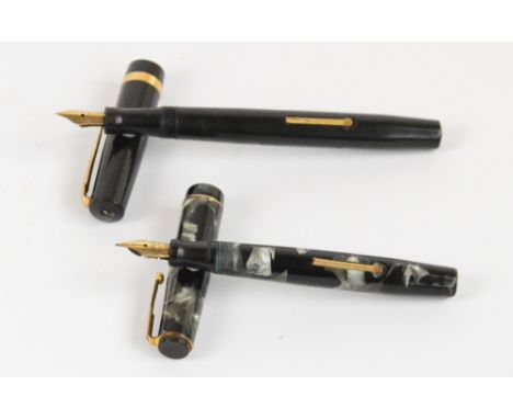 A "Blackbird" Mabie Todd BB205B/45 fountain pen with black and light green pearl marbled body, length 11.5cm, and a Swan Mabi