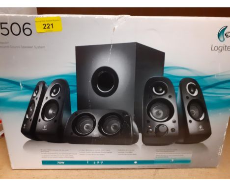 A Logitech Z506 surround sound speaker system Location: 