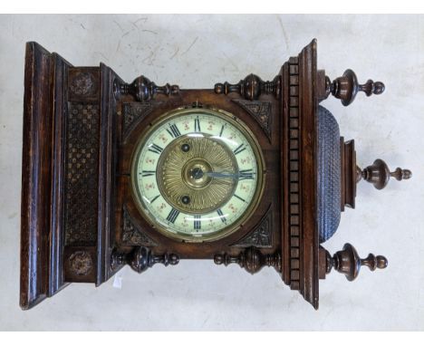 A late 19th century German mantle clock of architectural design striking on a single gong 43 h x 26w  Location: 