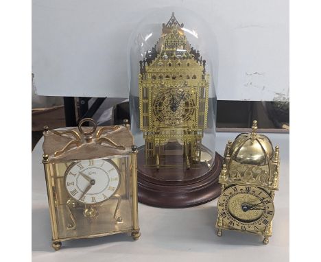 A mid 20th century Hermel mantel clock under dome in the form of the Elizabeth Tower (Big Ben), a Quartz Smith brass case exa