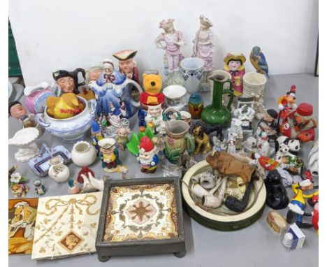 A mixed lot to include character jugs, Mintons wall tile, Carlton ware toaster rack, miniature models of animals and others, 