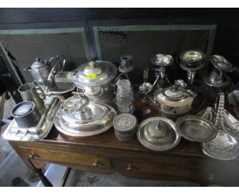 A mixed lot of silver plate and pewter ware to include a four-trumpet epergne holder, Old Sheffield plated chambersticks, tur