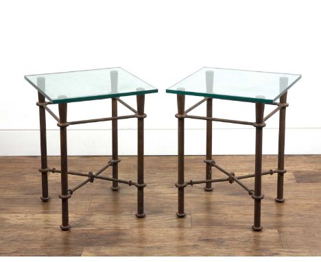 Pair of side or occasional tables standing on decorative metal bases with square glass tops, the bases measure 57cm high x 36