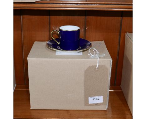 A set of 6 Legle Limoges, 18ct yellow gold-rimmed and navy blue porcelain coffee cups and saucers. 