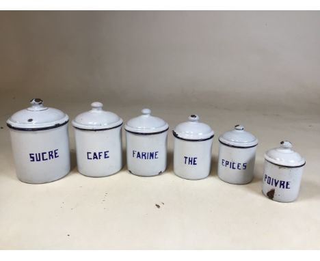 An enamel set of french storage containers - six in total. Some chips to the enamel. Tallest 20cm, smallest 13cm