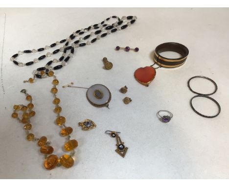 A collection of costume jewellery some gold plated and yellow metal items and two silver christening bracelets 