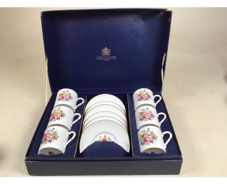 A boxed Royal Worcester Posies coffee set for six 
