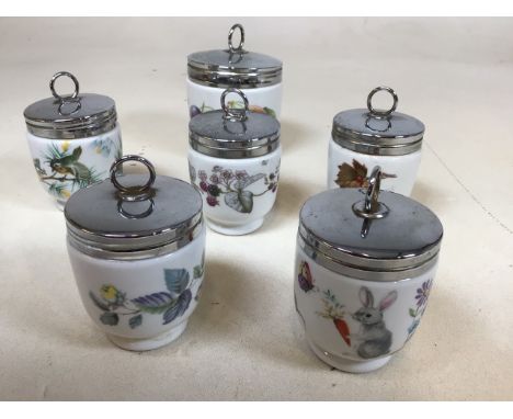 Six Royal Worcester egg coddles, largest of which is 10cm - assorted designs 