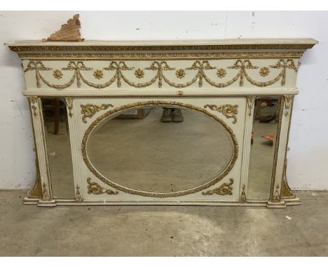 A decorative cream and gilt painted French style over mantle triptych mirror with original bevelled glass.W:145cm x H:83cm