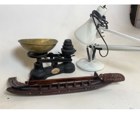 The Salter Staffordshire scales and weights, angle poise lamp and a Maori war canoe.