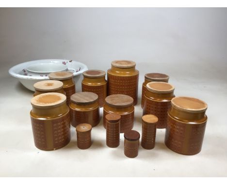 Ten Hornsea Saffron storage jars - one labelled sugar, with two cruet sets together with a vintage potty and bowl