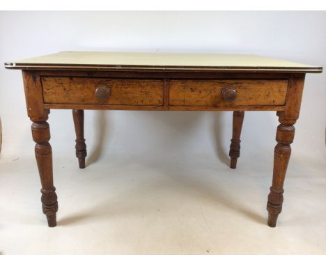 A Victorian pine kitchen table with two side drawers and turned legs, with vintage Formica top. W:122cm x D:82cm x H:77cm