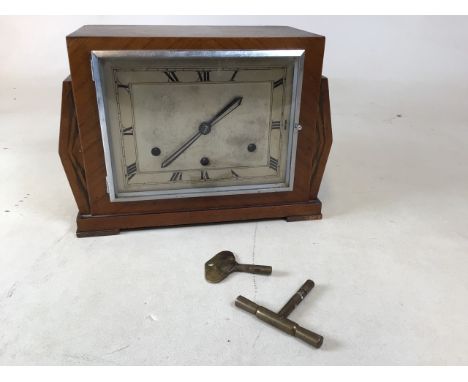 A 1930s Art Deco style clock made by the Perivale Clock Manufacturing company. Two keys insideUntested W:30cm x D:15cm x H:22