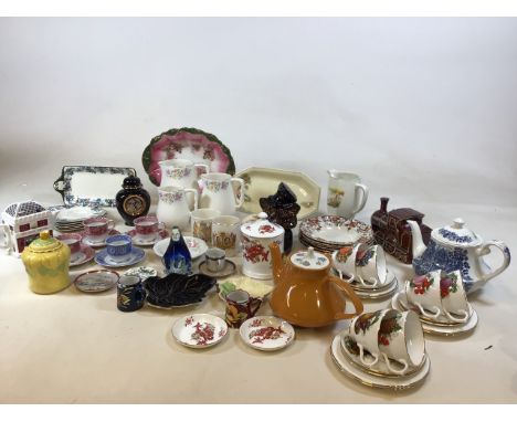A collection of ceramic items including Cartlonware, Prices, Polle pottery, Spode, Moss money box, Wilkinson, Woods, Royal Do