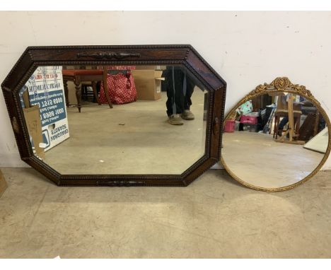 An oak framed octagonal mirror with details also with a modern gilt circular mirror. W:86cm x H:63cm