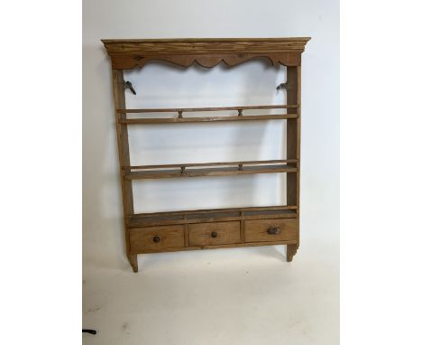 A small country pine spice rack with three  drawers to base. W:56cm x H:70cm D:10cm