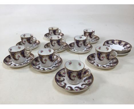 Early twentieth century Royal Worcester hand painted and gilded cups and saucers in rose design. Twelve saucers and nine cups